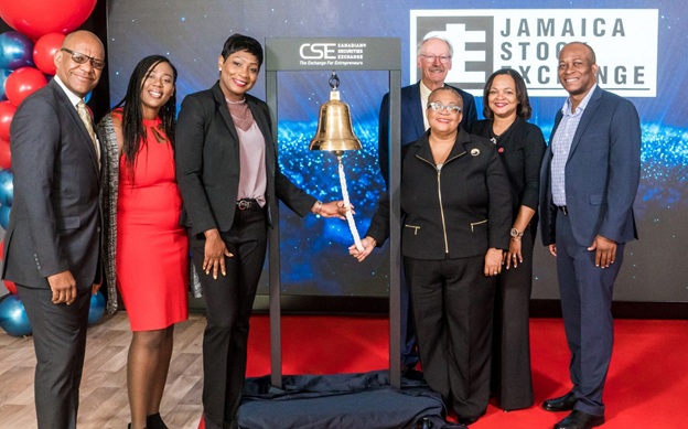 Jamaica Stock Exchange ringing the CSE bell for a market open ceremony.